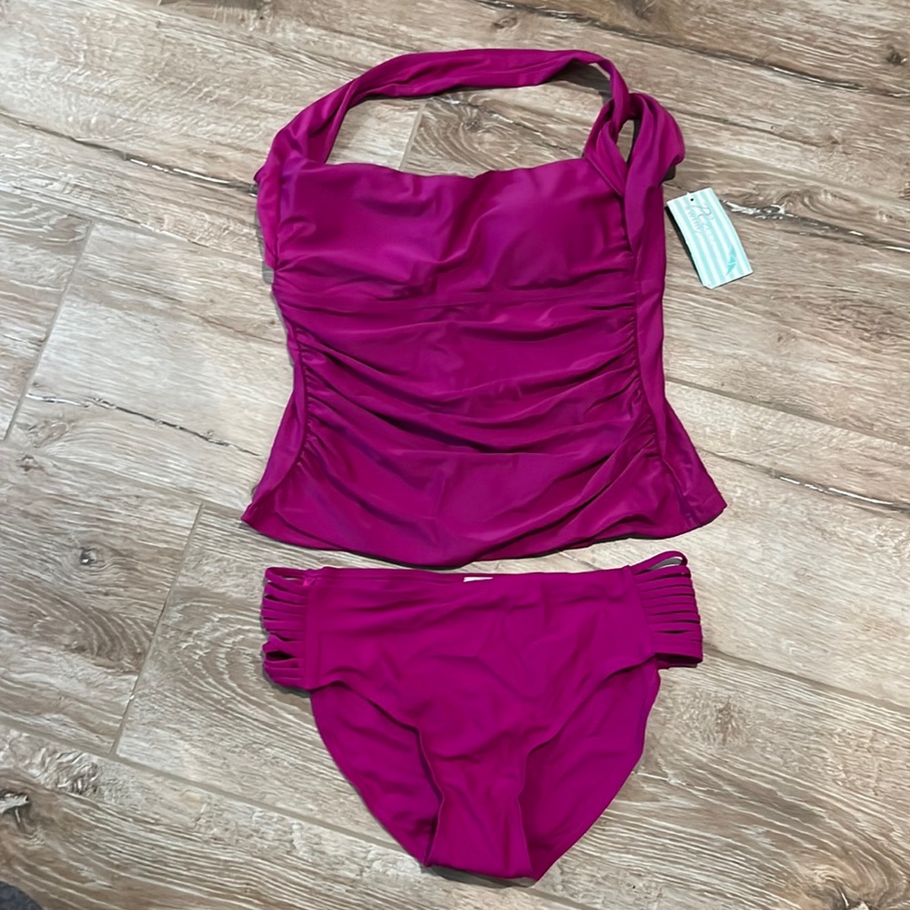 Fuchsia tankini swimsuit.